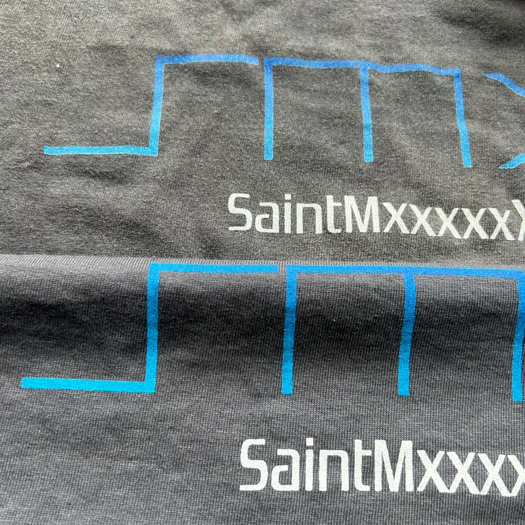 Printing proofing SAINT Mxxxxxx SM6 TEE/BLK Latest SM6 basic LOGO printed TEE Washed black S-XL Garment dyeing Rewashed to make it worn Hanging holes Correctly with anti-counterfeiting angel mark